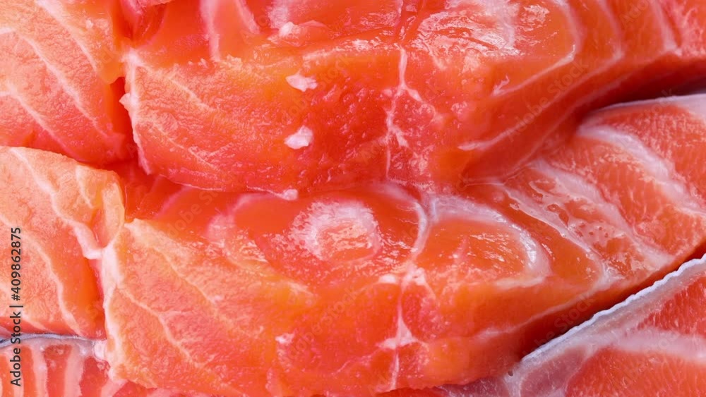 Close-up of slices of fresh raw red salmon