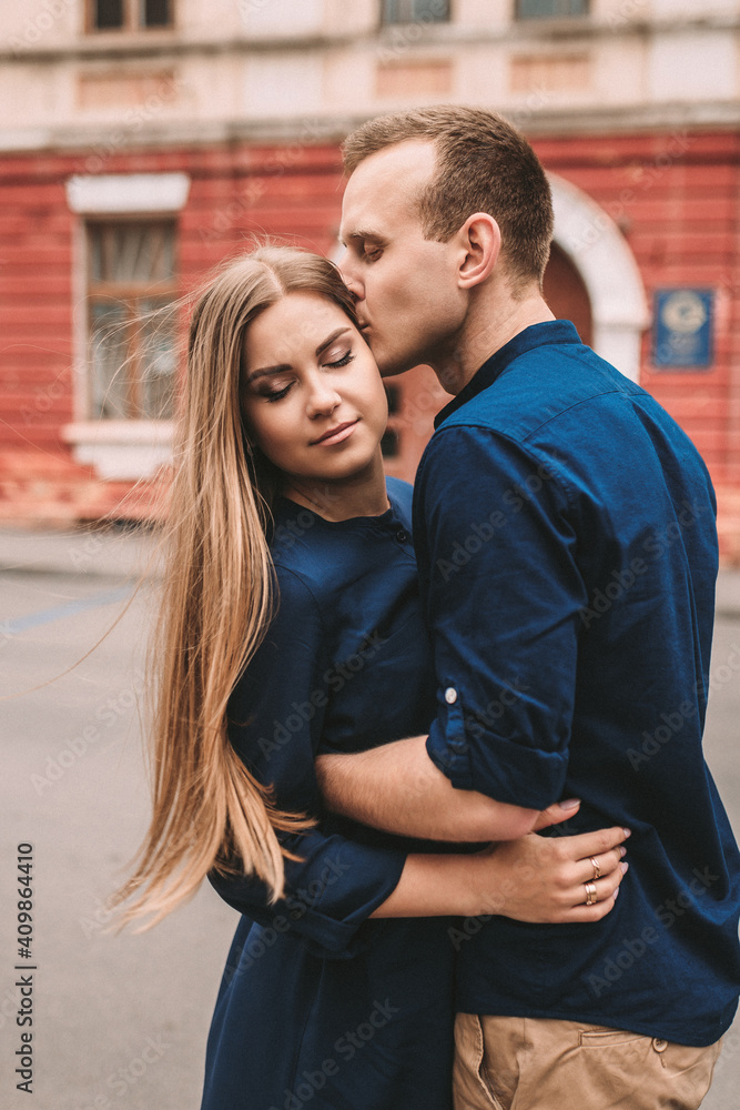 Happy young couple. The concept of a happy family with strong feelings. Young people in love Happy young couple. The concept of a happy family with strong feelings. Young people in love