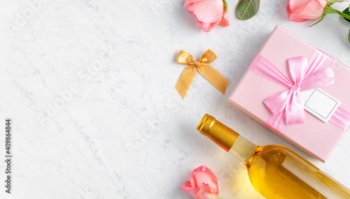 Giftbox and pink rose for Valentine's Day holiday gift design concept.