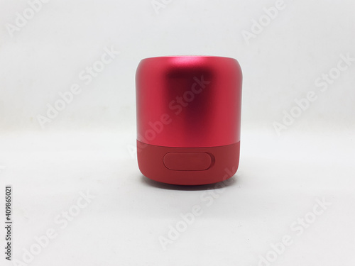 Modern Red Silver Metallic Electric Wireless Portable Music Speaker in White Isolated Background 
