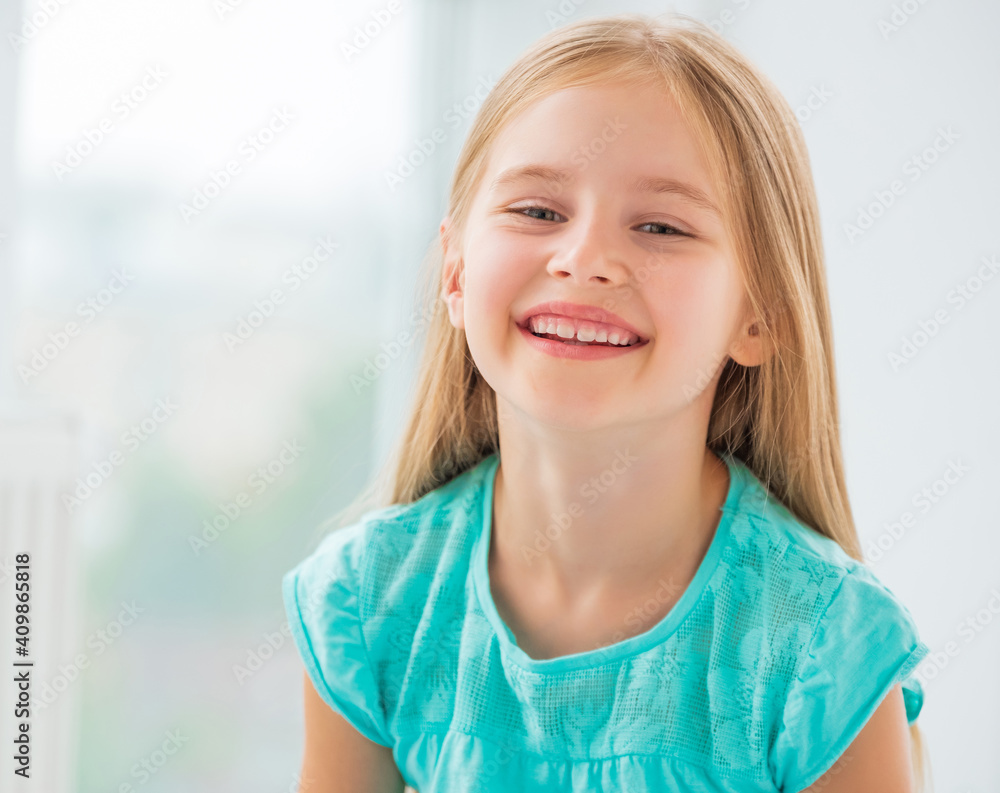 Portrait of smiling beautiful school girl Portrait of smiling beautiful school girl