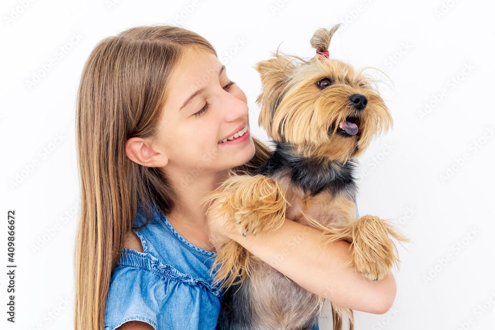 Friendly female child smiling to terrier dog Friendly female child smiling to terrier dog