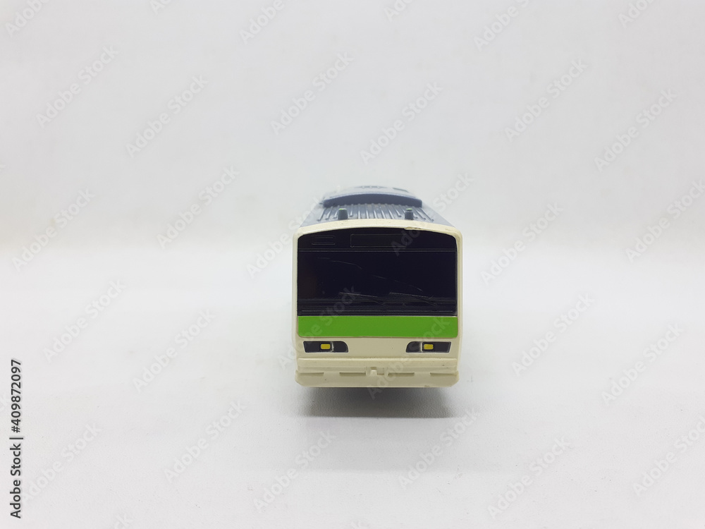 Colorful Cute Plastic Stainless Steel Electric Train Carriage Locomotive Model Kids Toys in White Isolated Background Colorful Cute Plastic Stainless Steel Electric Train Carriage Locomotive Model Kids Toys in White Isolated Background