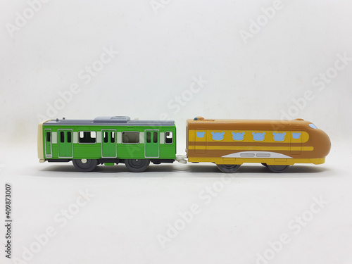 Colorful Cute Plastic Stainless Steel Electric Train Carriage Locomotive Model Kids Toys in White Isolated Background