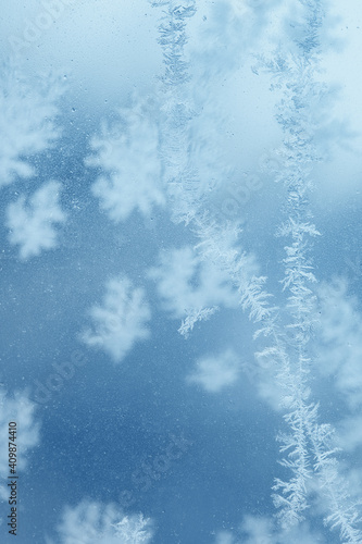 frosty pattern on glass © Evgenia Tiplyashina