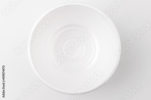 Disposable container on white background
