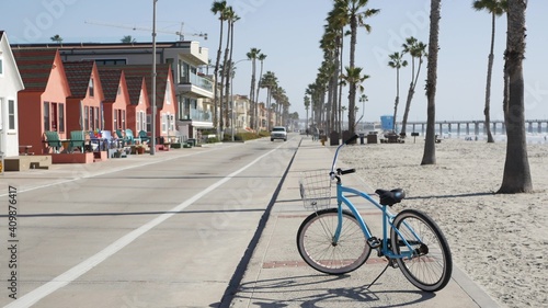 Tela Blue bicycle, cruiser bike by ocean beach, pacific coast, Oceanside California USA