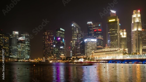 Wallpaper Mural Singapore at night timelapse with traffic boats on the river Torontodigital.ca