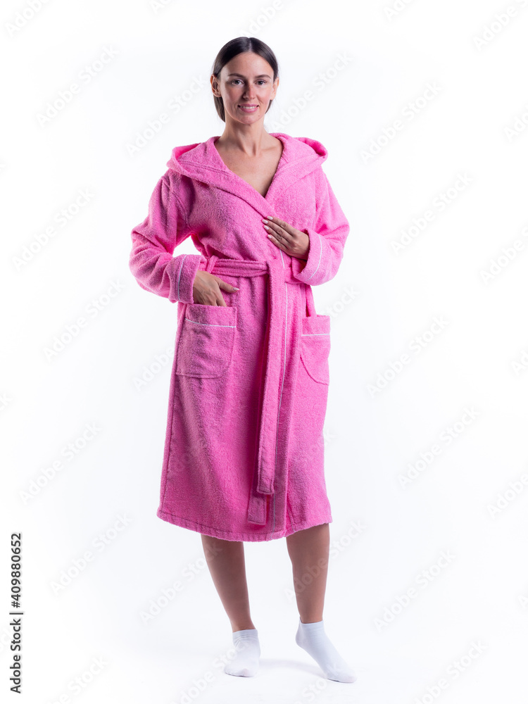 woman in a Bathrobe on an isolated white background with a smile on her face. woman in a Bathrobe on an isolated white background with a smile on her face.