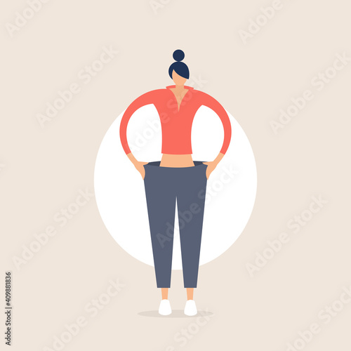 Fit young woman in a loose pants after losing weight
