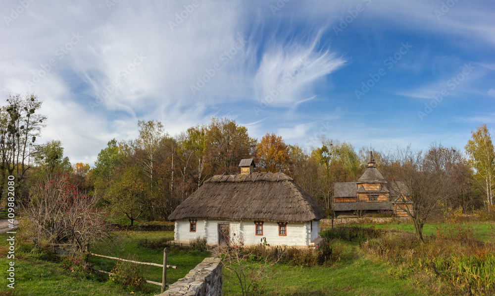 Landscape with old Ukrainian wooden rural house, Pyrohiv, Kyiv, Ukraine