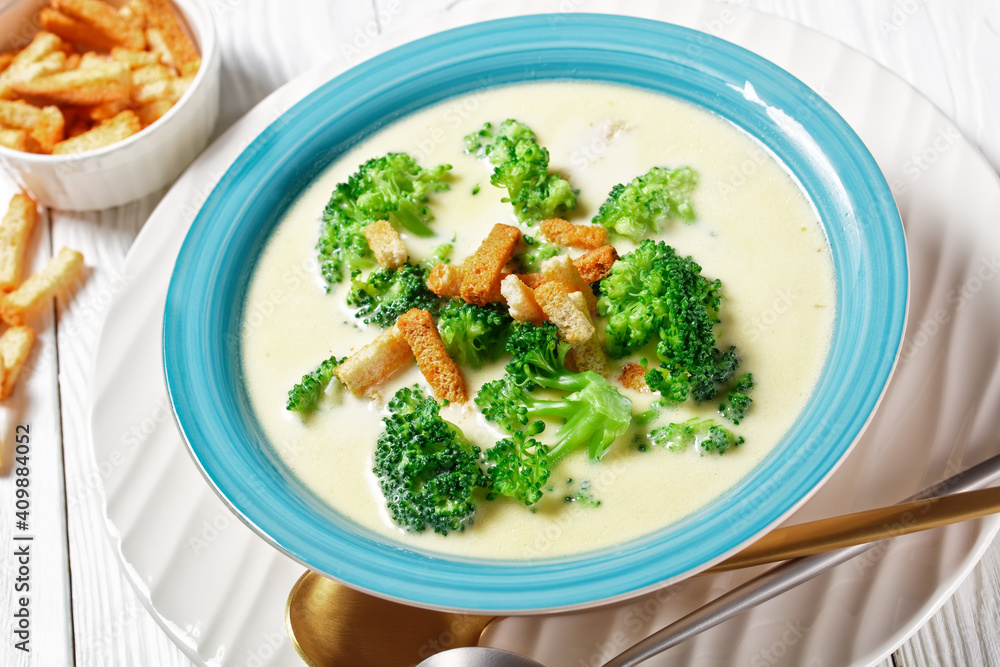 cream soup with broccoli and croutons in a bowl cream soup with broccoli and croutons in a bowl