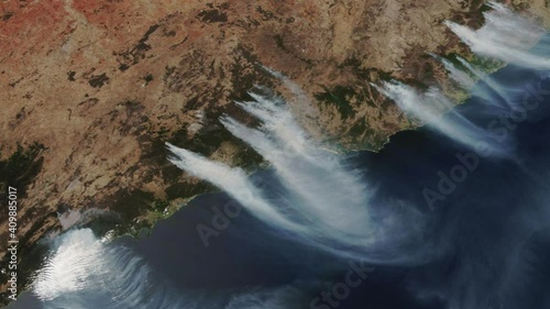 The Australian fires burning viewed from space from a satellite. Contains public domain image by NASA. photo