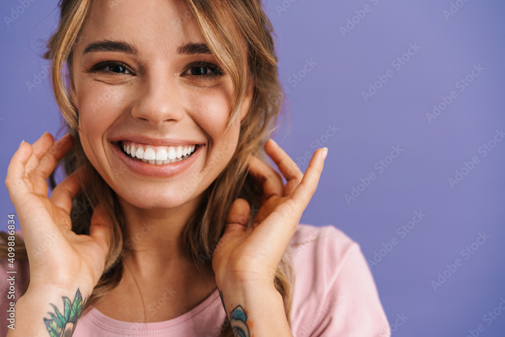 Fototapeta premium Happy beautiful nice girl smiling and looking at camera