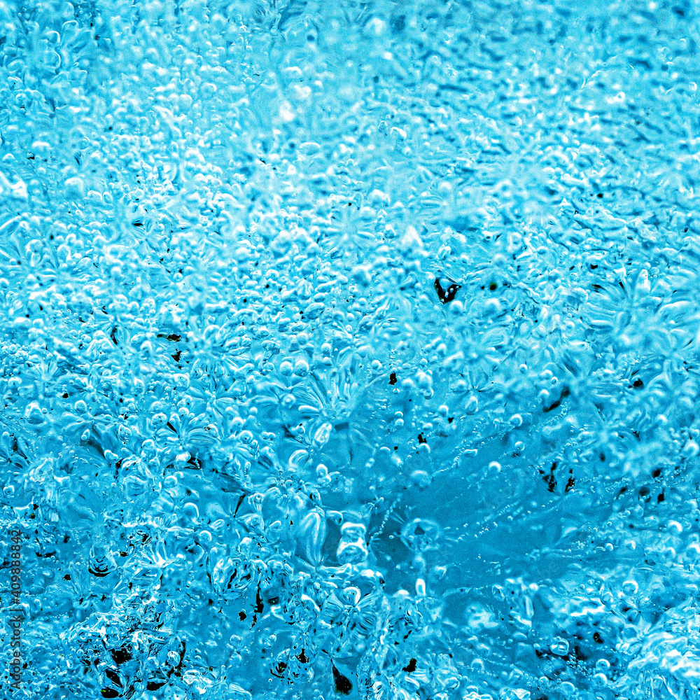 Obraz premium Frost. Winter background. Ice with close-up air bubbles. Winter.