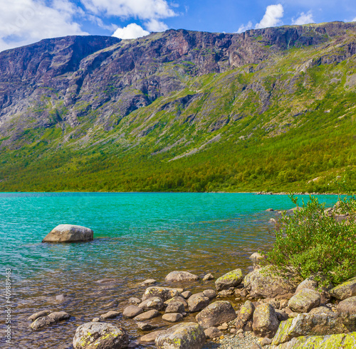 Amazing Besseggen Mountain ridge and turquoise lake landscape in Norway. photo