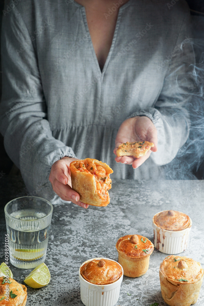 Empada de camarao or empadinha is traditional snack of Brazilian cuisine, small savory pie stuffed with shrimps Empada de camarao or empadinha is traditional snack of Brazilian cuisine, small savory pie stuffed with shrimps