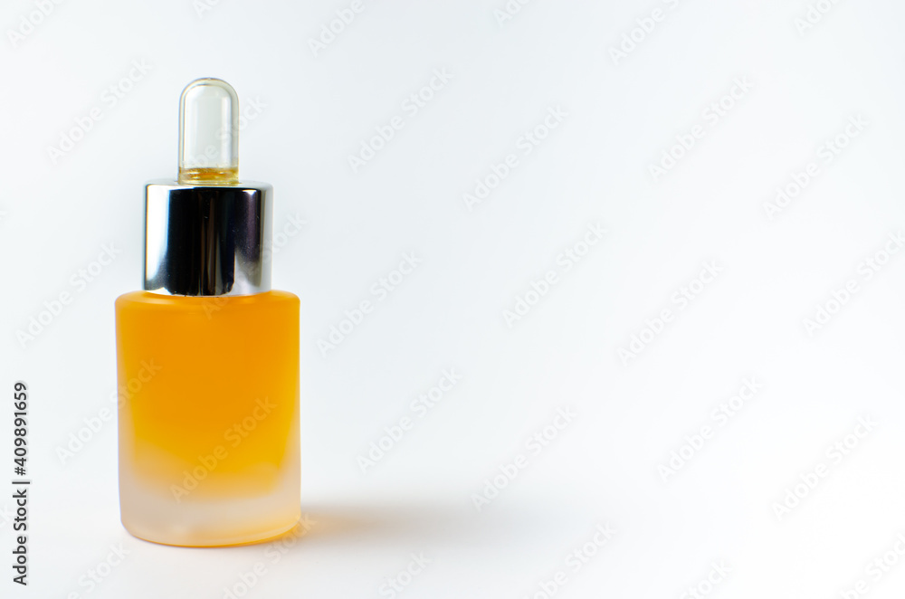 Beauty cosmetic orange color on white background isolated, face care cream, dropper, brush on for healthy make up. Product container design bottles. Skin care products on empty background