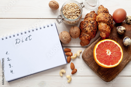 Healthy breakfast, diet plan, healthy food concept, white wood background