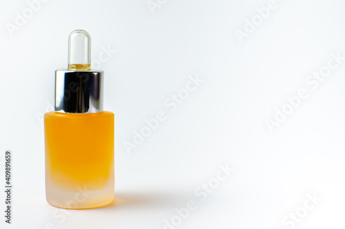 Beauty cosmetic orange color on white background isolated, face care cream, dropper, brush on for healthy make up. Product container design bottles. Skin care products on empty background