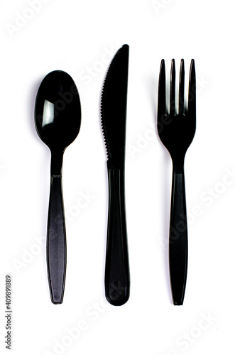 Wallpaper Mural Black plastic cutlery knife fork spoon isolated on white background low highlight. For kitchen restaurant and table set up. concern to plastic conservative recycle items and one time use utensils Torontodigital.ca