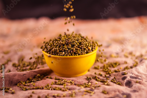 Tablou pe pânză Falling Yellow moong dal, Indian pulse, yellow mong dal and green Moong bean wit
