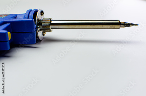 Wallpaper Mural Man use blue color soldering iron to fix mainboard or motherboard chipset close up shot with other fixing tools concern engineer workshop and industrial in 2021 Torontodigital.ca