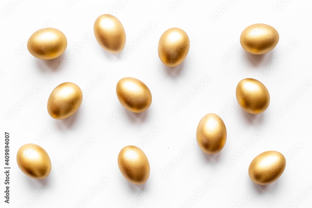 Golden Easter eggs isolated on white background. Top view Golden Easter eggs isolated on white background. Top view