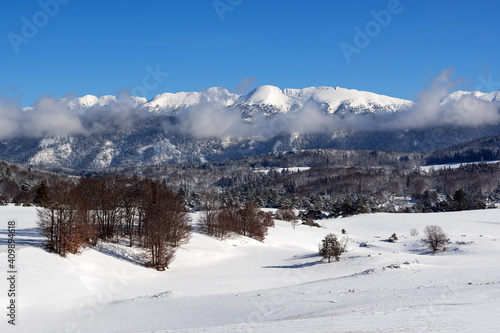 French winter landscapes. Panoramic view of mountain peaks and canyons. Vercors Regional Natural Park. © PhotoGranary