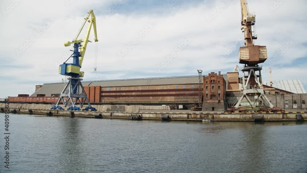 Ventspils, Latvia cargo and fisherman port and beach summer time, non freeze port Ventspils, Latvia cargo and fisherman port and beach summer time, non freeze port