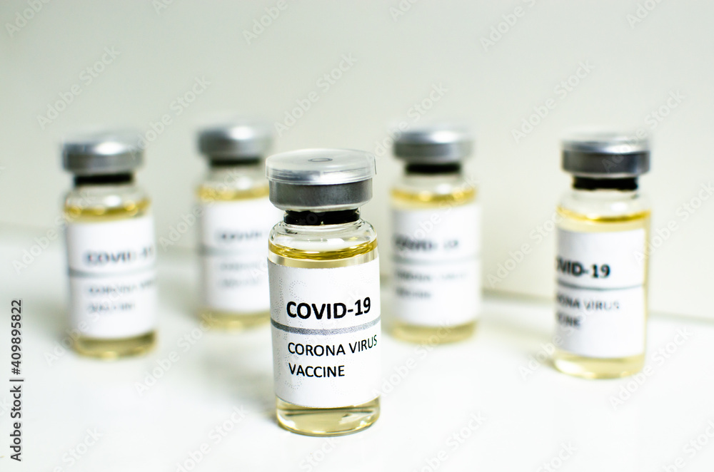 Covid-19 or Coronavirus vaccine in mini medicine bottles on white background, concern disease pharmacy in laboratory and drug to cure people. Healthcare and Medical concept. Development of research. Covid-19 or Coronavirus vaccine in mini medicine bottles on white background, concern disease pharmacy in laboratory and drug to cure people. Healthcare and Medical concept. Development of research.