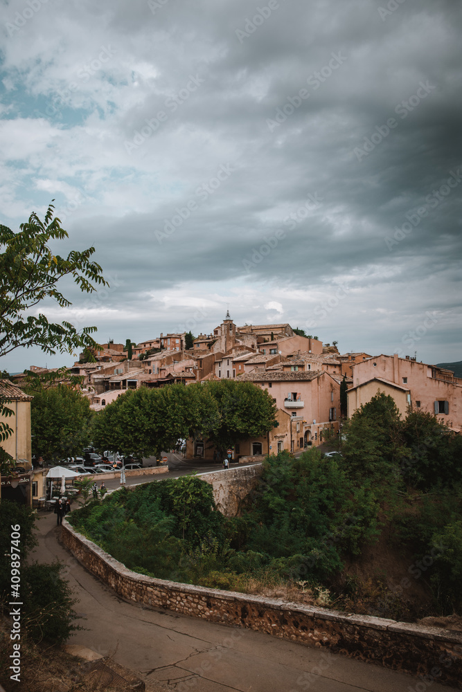 View on Roussillon, small Provensal town with large ochre deposits, located within borders of Natural Regional Park of Luberon. Near Roussillon, Provence Alpes Cote d'Azur, South of France