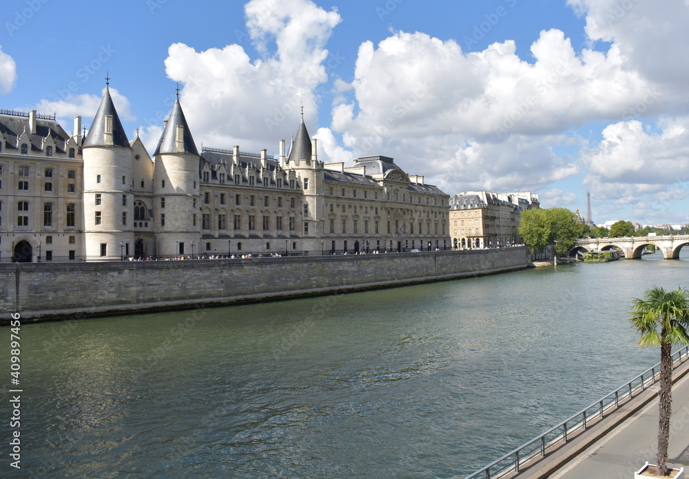 View of La Conciergerie from a bridge over the Seine River. Paris, France.  