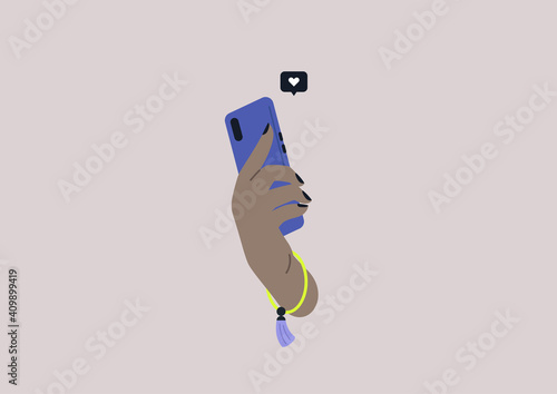 Modern technologies, a hand holding a mobile phone, millennial lifestyle