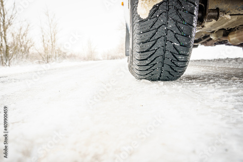 Winter tires on a snowy road. © Максим Травкин