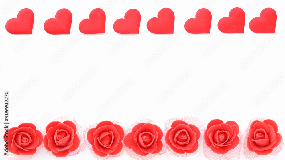 A group of red hearts and Rose shapes on a white background with copy space. Love and Valentine's day theme. A group of red hearts and Rose shapes on a white background with copy space. Love and Valentine's day theme.