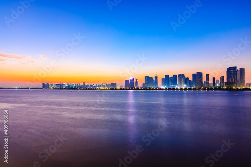 Modern city skyline and buildings in Hangzhou at sunrise,China.panoramic view.