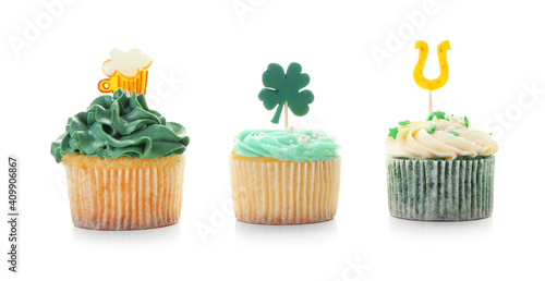 Fototapeta Naklejka Na Ścianę i Meble -  Tasty cupcakes for St. Patrick's Day on white background