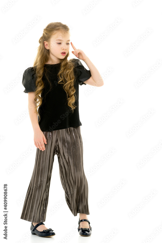 The little girl thinks.Isolated on white background. The little girl thinks.Isolated on white background.