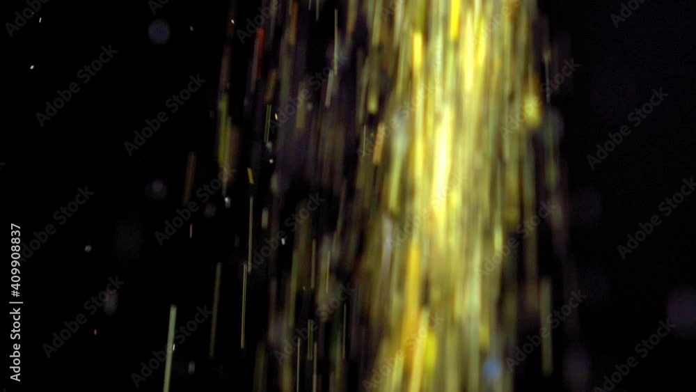 Golden Glitter Particles Falling Down on Black Background Slow Motion Golden Glitter Particles Falling Down on Black Background Slow Motion