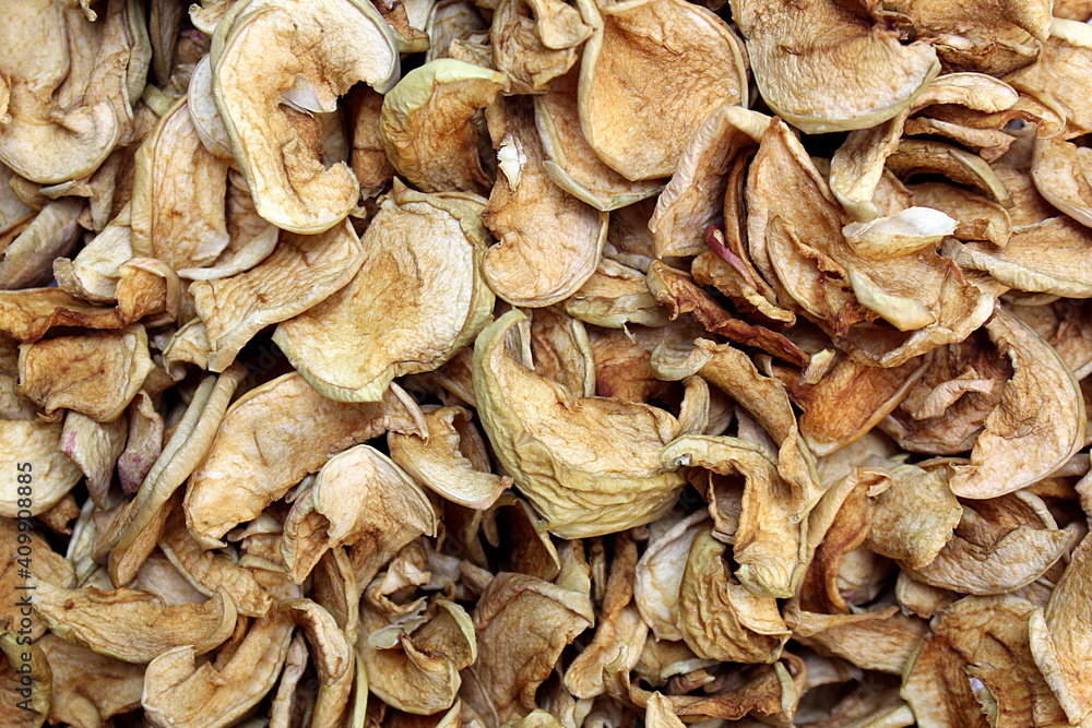 texture of dried apples cut into thin slices. texture of dried apples cut into thin slices.