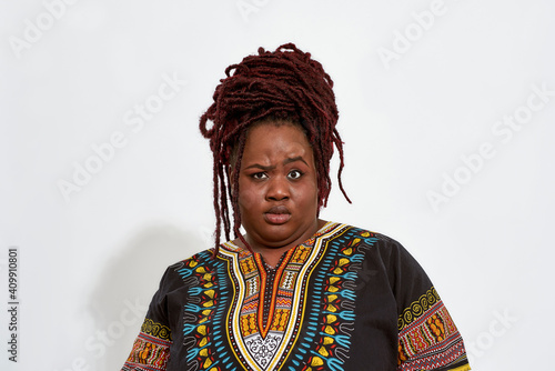 Photography Confused plump young african american woman
