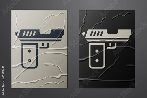 White Pistol or gun icon isolated on crumpled paper background. Police or military handgun. Small firearm. Paper art style. Vector.