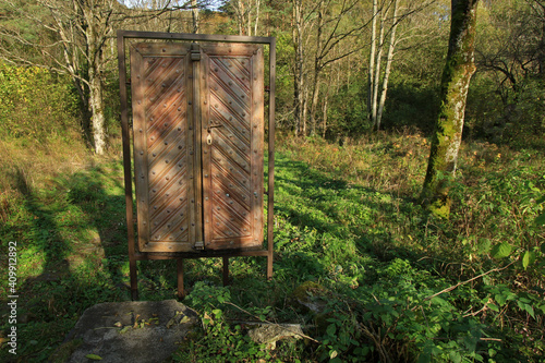 Old wooden door from  non-existent orthodox church in Jaworzec - former and abandoned village in Bieszczady Mountains, Poland 