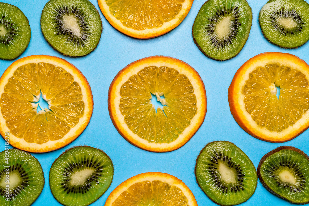 Fruity background set of slices of orange fruit and kiwi. Fruity background set of slices of orange fruit and kiwi.