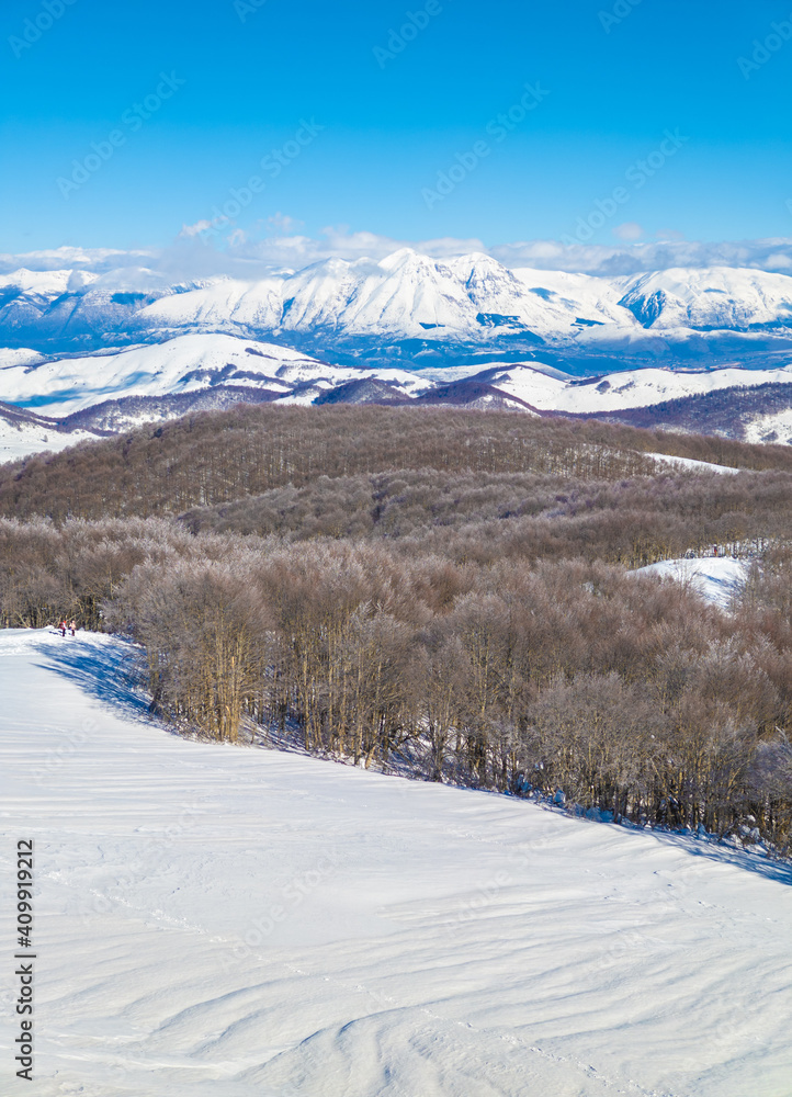 Fototapeta premium Mount Autore Livata (Subiaco, Italy) - The snow capped peaks mountains in the province of Roma, Lazio region, in Simbruini mounts. Here a beautiful white landscape.