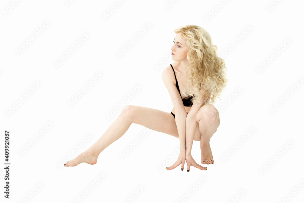Slim woman in black underwear on white background Slim woman in black underwear on white background