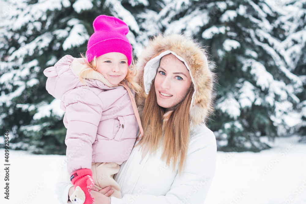 Happy Family Mother And Baby Girl Daughter Playing And Laughing In Winter Snow Happy Family Mother And Baby Girl Daughter Playing And Laughing In Winter Snow
