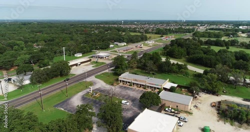 Aerial flight over the city of Krugerville in Texas. Audrey can be seen as the camera rises up. photo