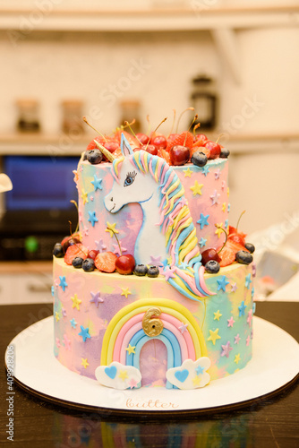 cake with berries and unicorn